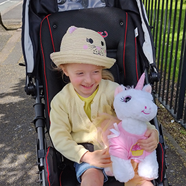 Charlotte in her swifty buggy